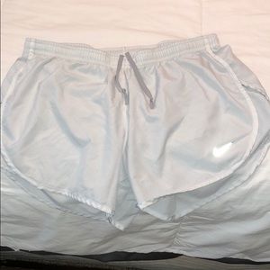 White Nike shorts